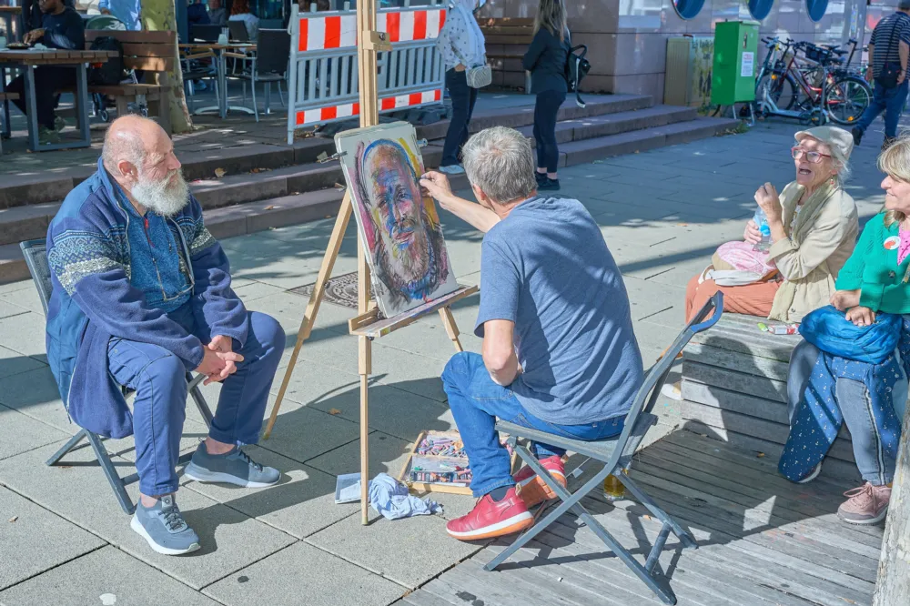 Ein Porträtist bei seiner Arbeit